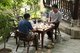 China: Playing chess or Xiangqi at Cuiwei Yuan, originally a Guanyin temple now a teahouse, Guiyang, Guizhou Province